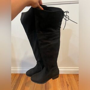 Black knee high boots. Size 6.5. Never worn